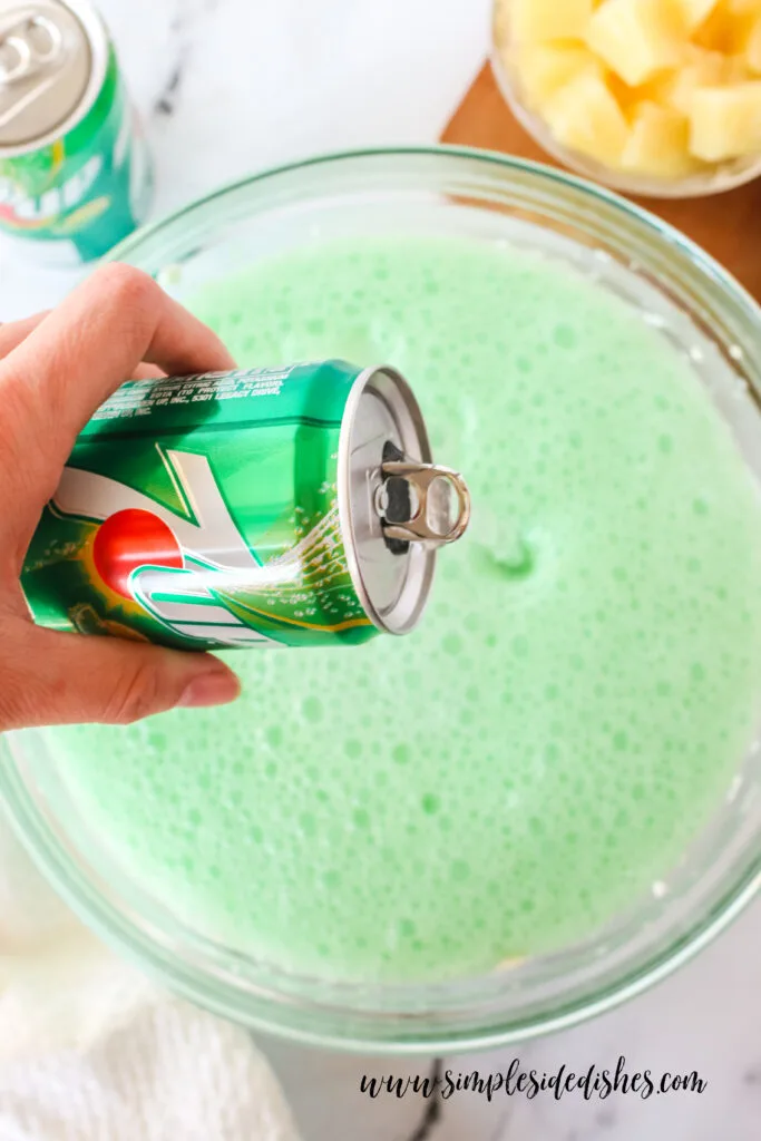 Cream cheese and jello mixed together with 7up being added to jello.