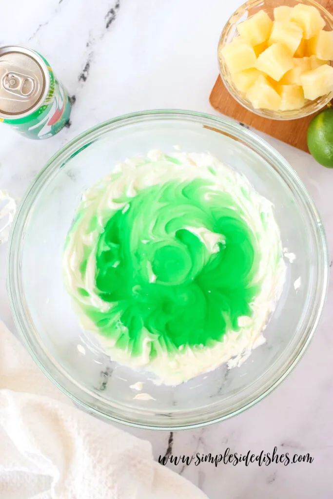 Cooked jello poured over cream cheese.