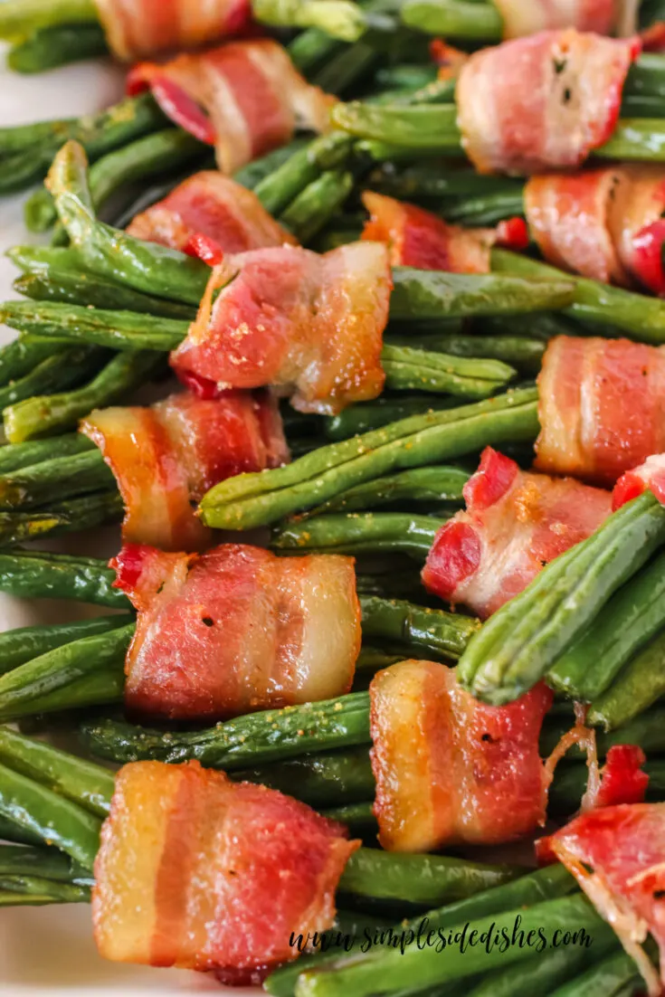 zoomed in image of cooked green beans on platter ready to serve.