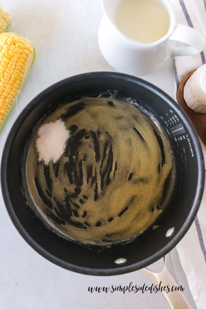 butter and flour have been mixed together. Sugar and salt have been added.