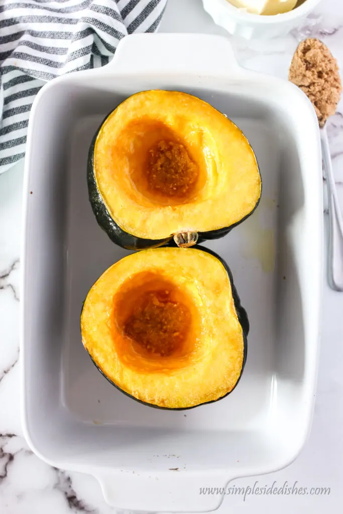 Acorn squash with leftover butter brown sugar mixture poured in the center bowls.