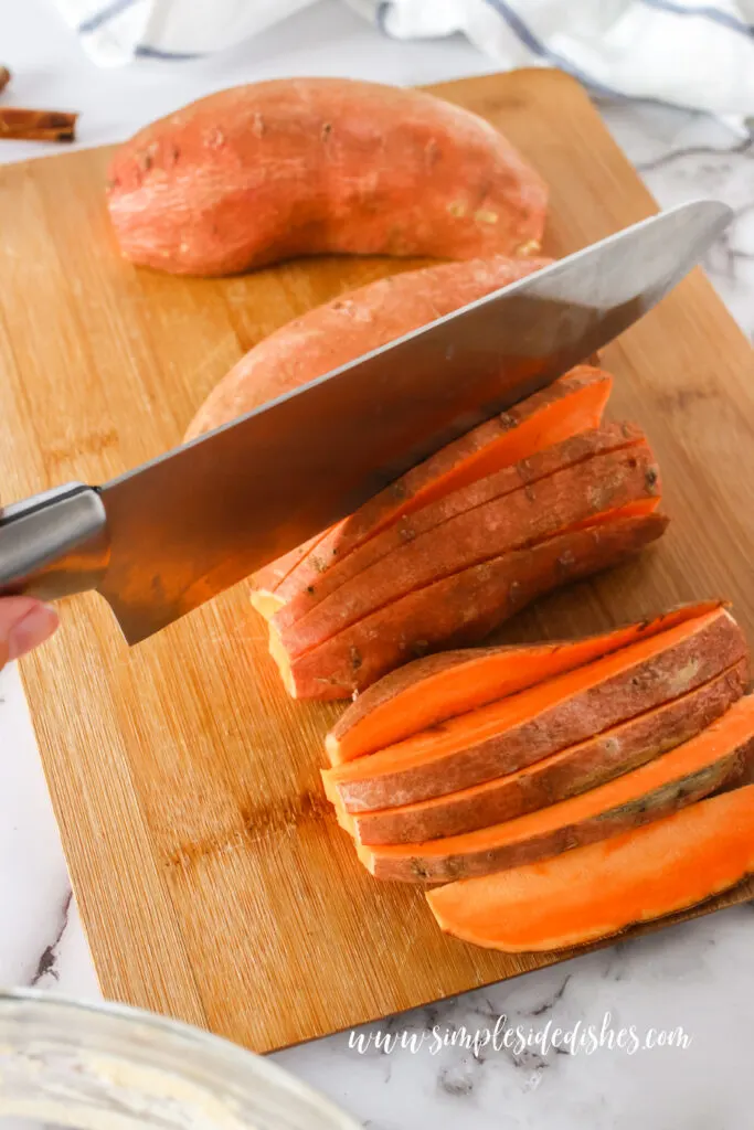 sweet potatoes being cut into slices