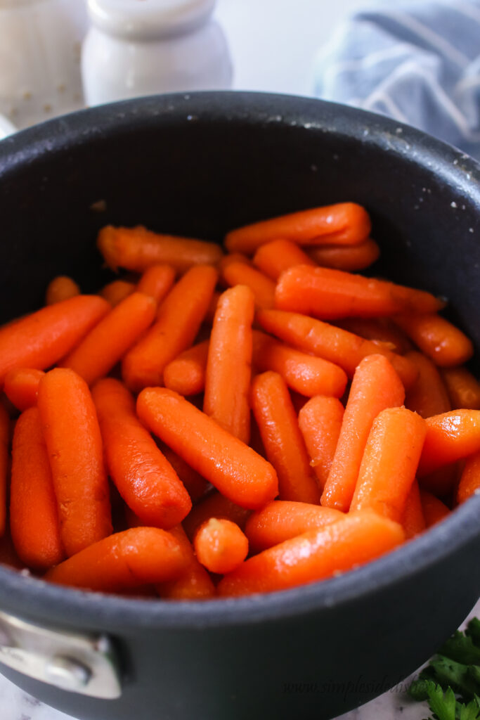 cooked carrots in a pot