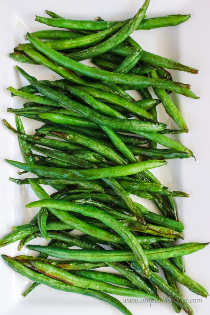 zoomed in image of green beans on a platter.
