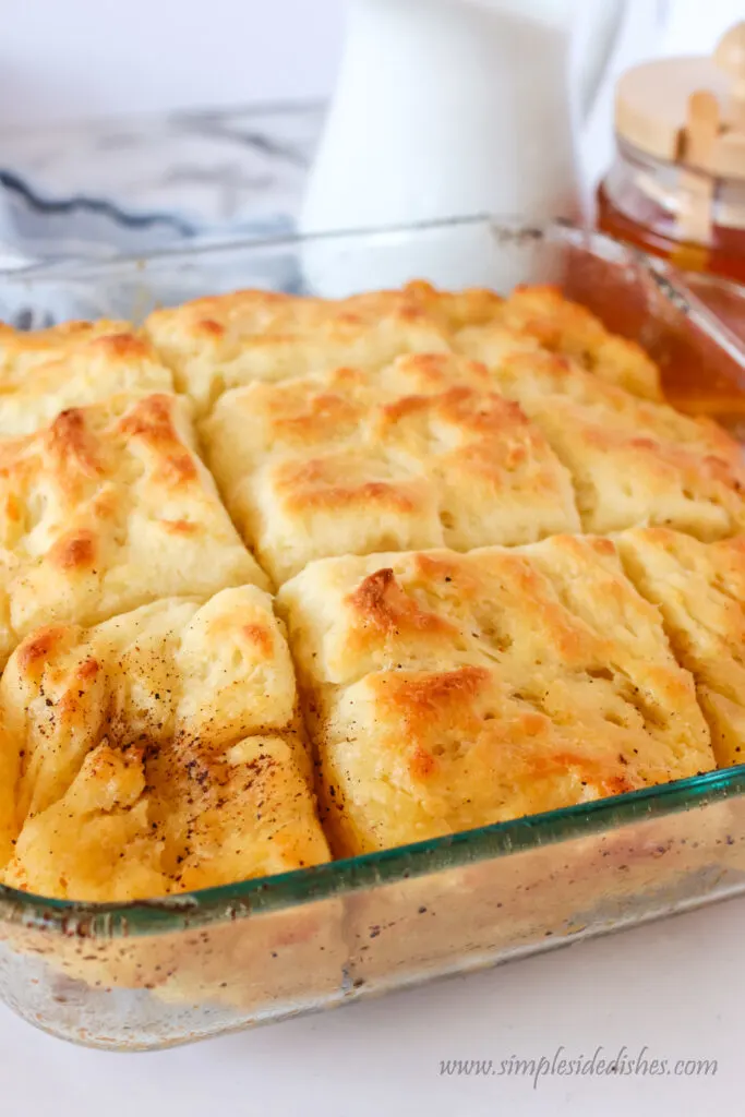 side view of biscuits fresh out of the oven still in pan