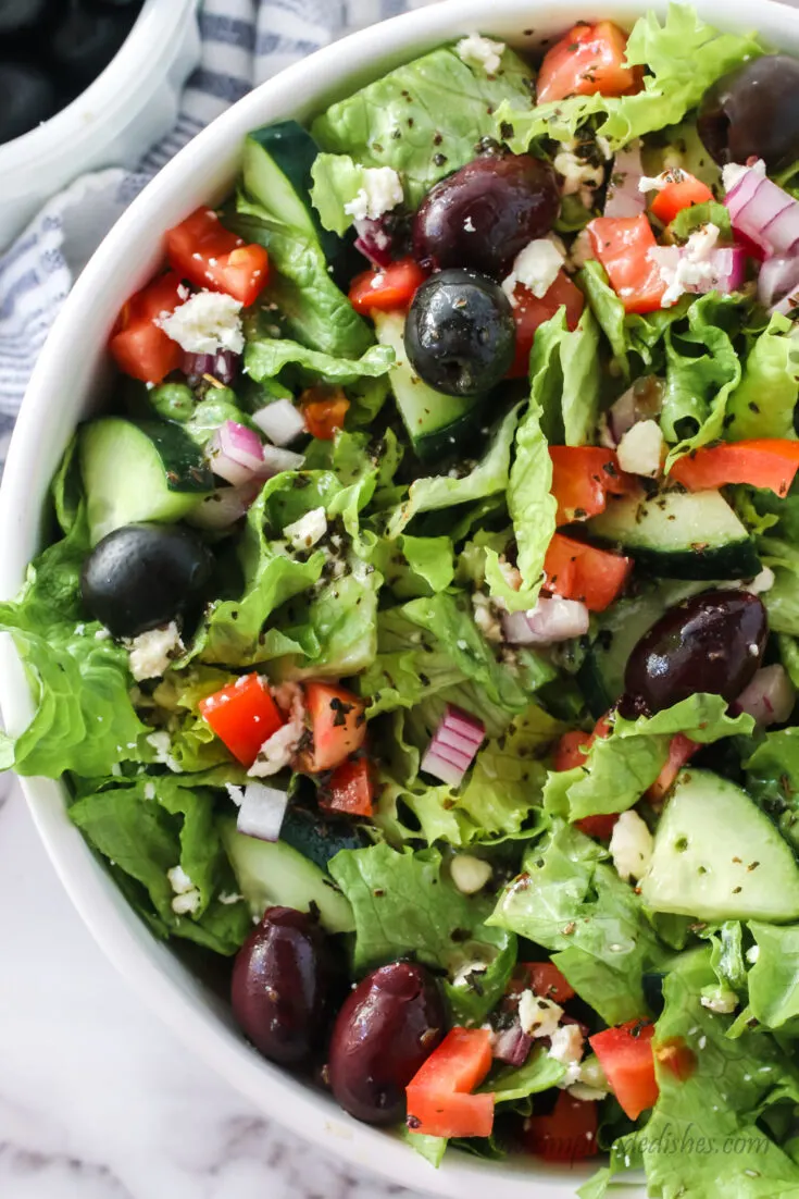 photoof greek salad taken from the top looking down.