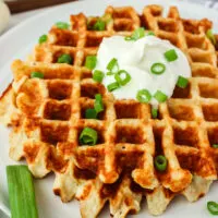 Tilted photo of potato waffles on a plate