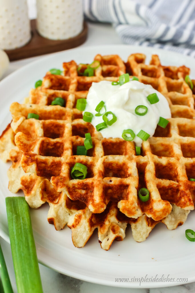 Tilted photo of potato waffles on a plate