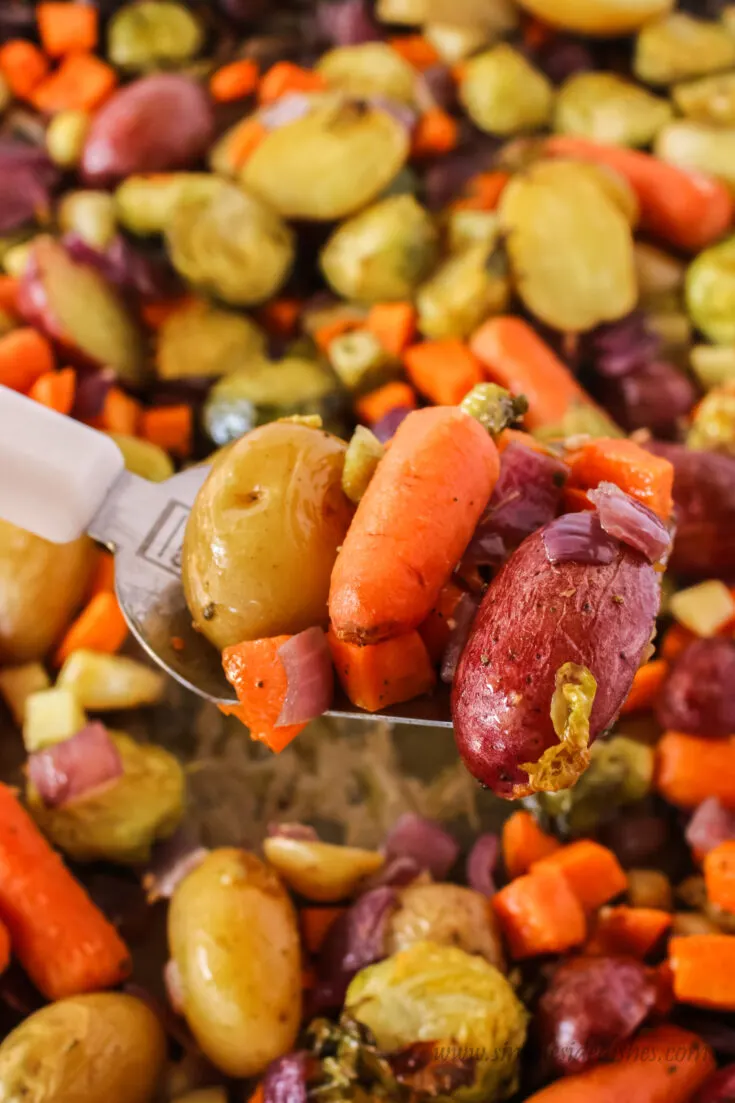 fork full of roasted vegetables