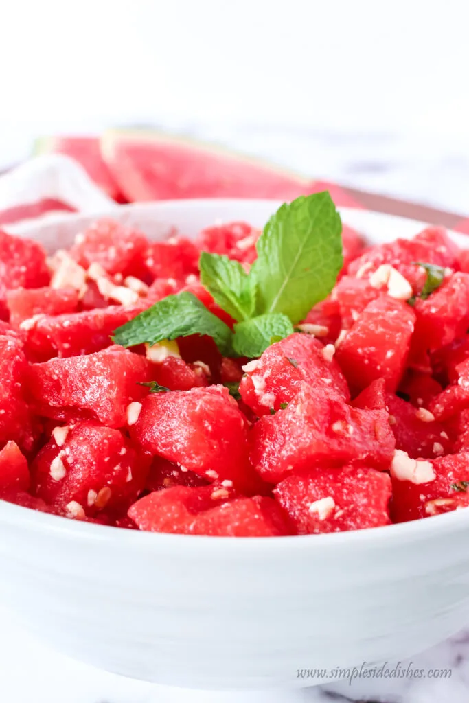 side view of watermelon salad ready to serve.