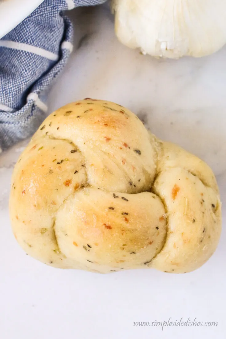 close up of garlic herb knot to show knotting.