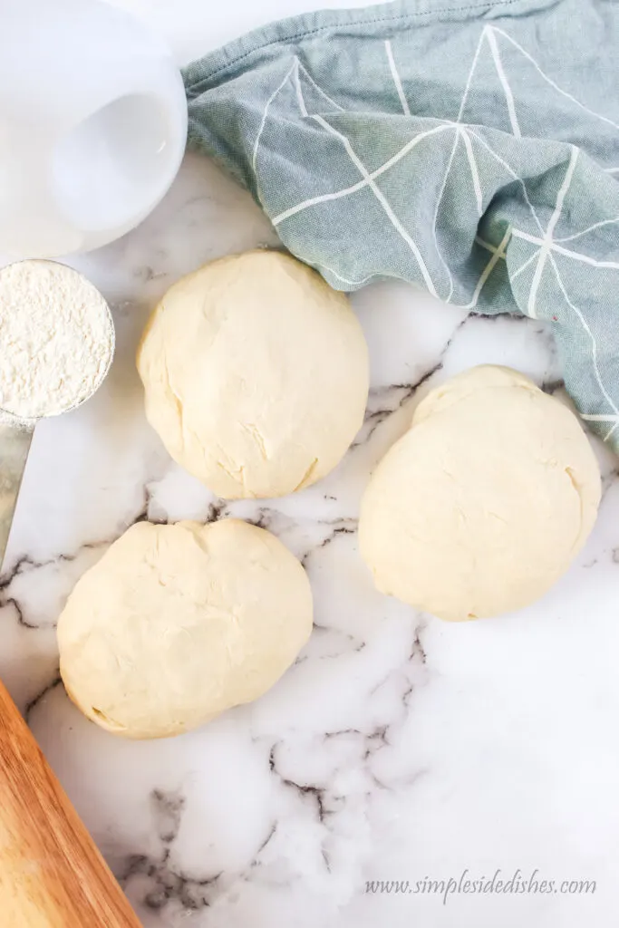 bread dough split into 3 sections