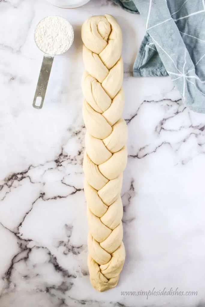 dough rolled out and braided into a long braid