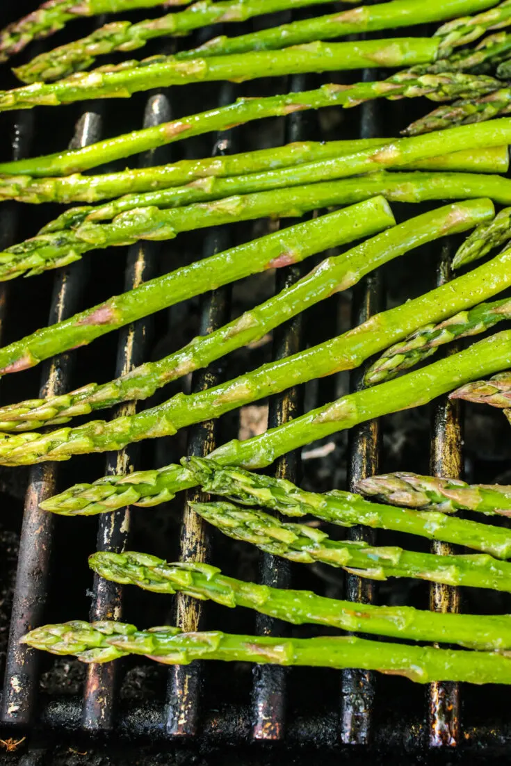 close up of asparagus on the grill