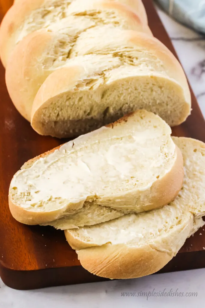 top side view of braided bread slices with butter