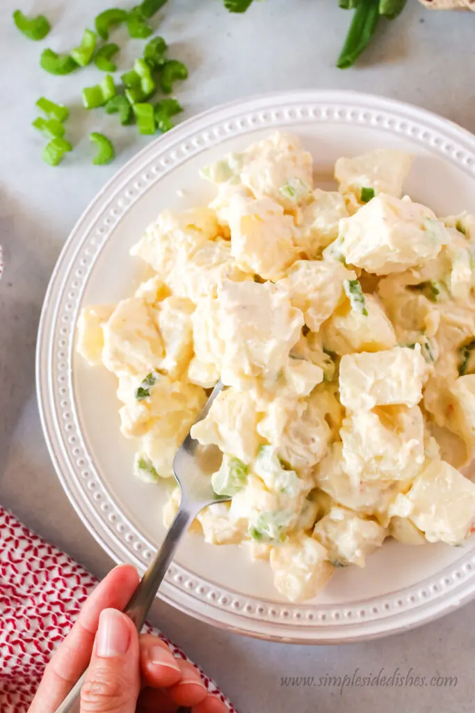 potato salad on plate with fork