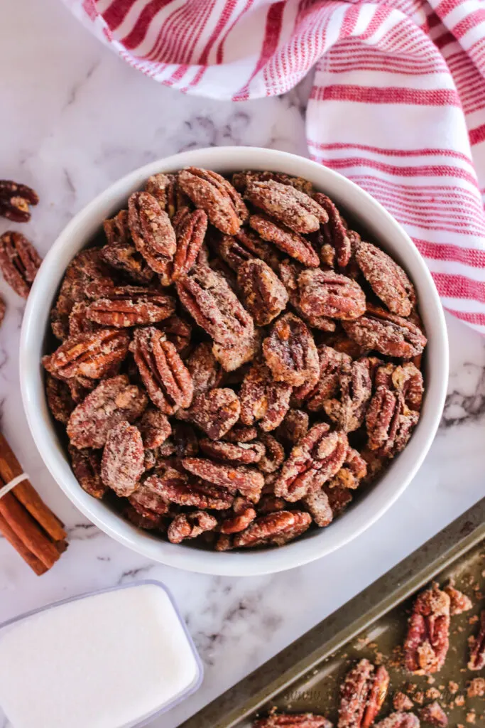 baked pecans in a bowl. View from the top looking down.