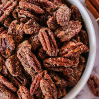 zoomed in close up of pecans in a bowl