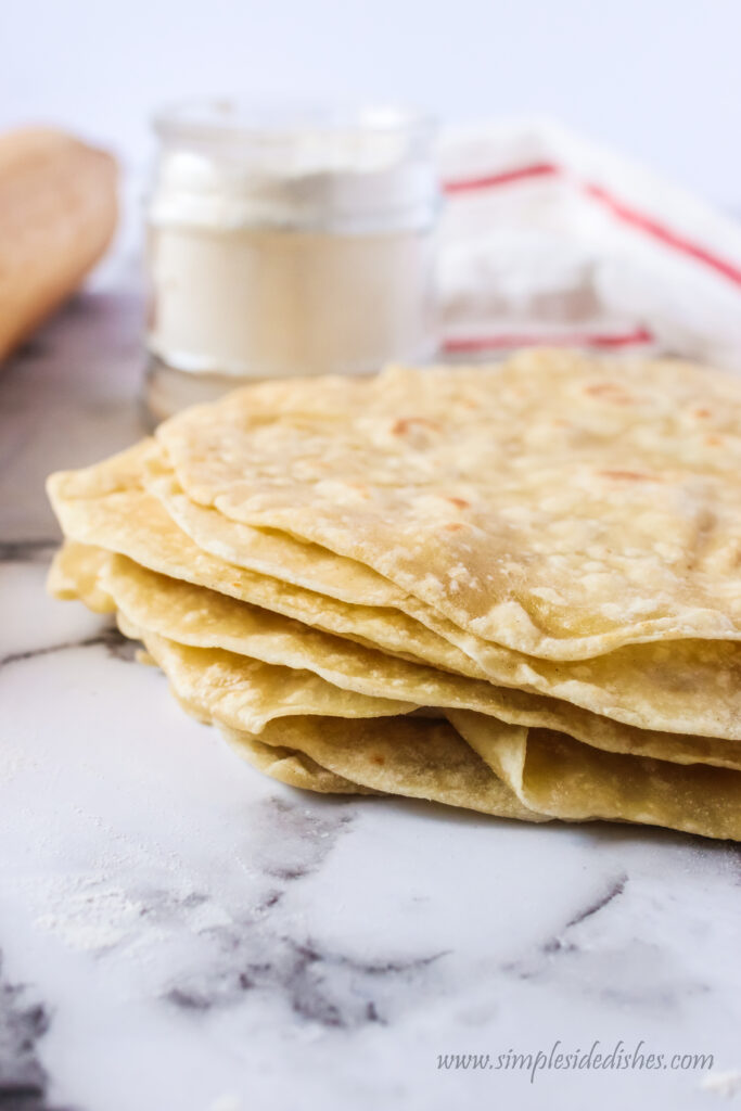 side view of tortillas stacked up on counter