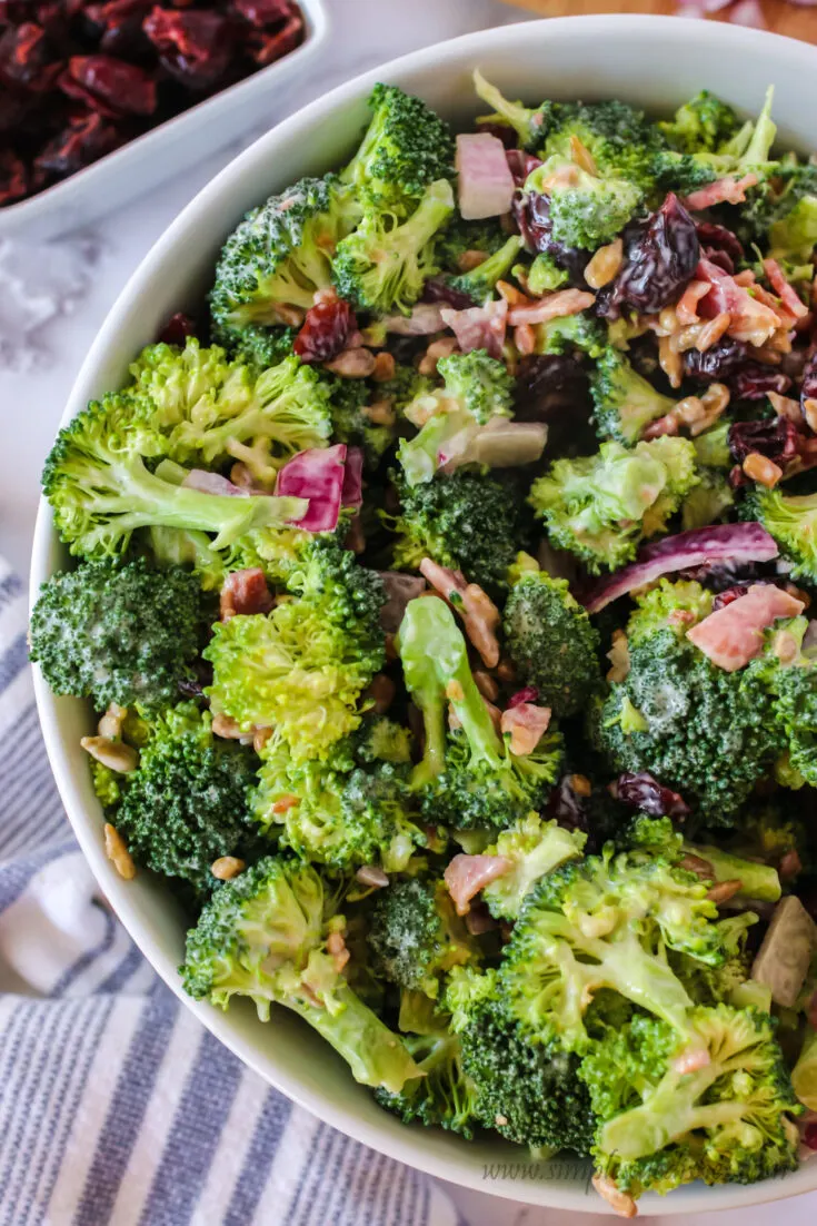 zoomed in photo of broccoli salad with bacon in bowl