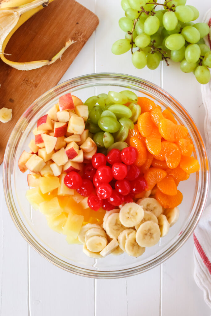 sliced fruit in a bowl, unmixed