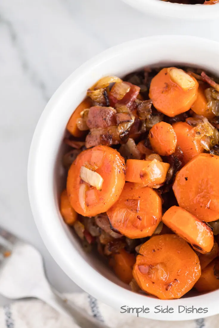 zoomed in image of carrots fried in bacon fat