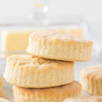 3 self rising biscuits stacked up on top of each other