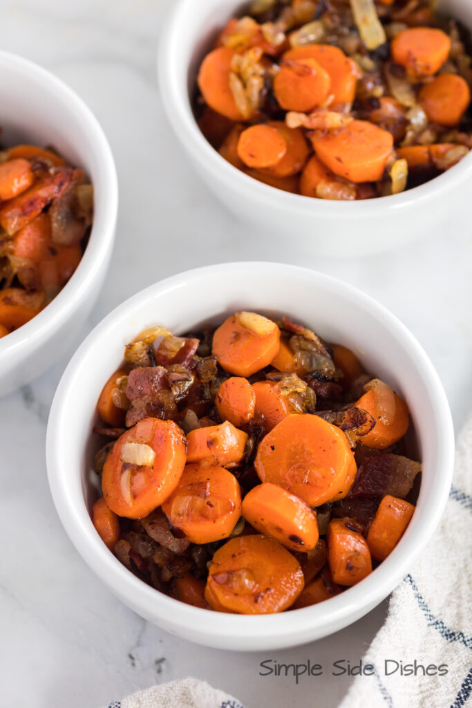 3 bowls of bacon carrots ready to serve
