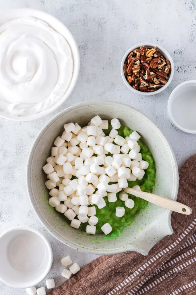 marshmallows added to the pineapple pudding mixture