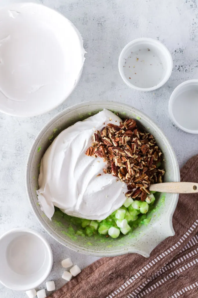 cool whip and pecans added to the pudding mixture.