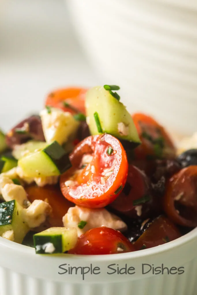 zoomed in side view of salad in bowl.