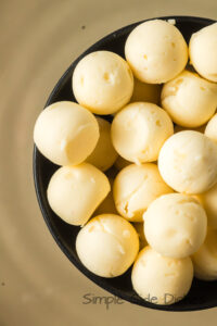 molded butter balls in a bowl, ready to serve.