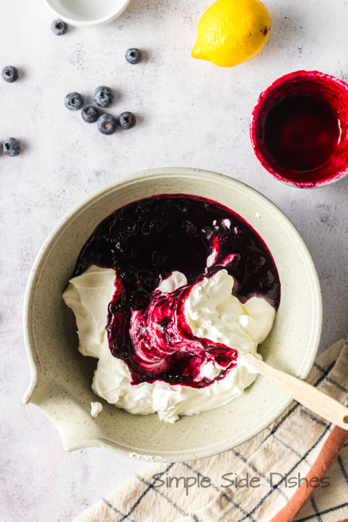 Cooled blueberry mixture poured over whipped cream.