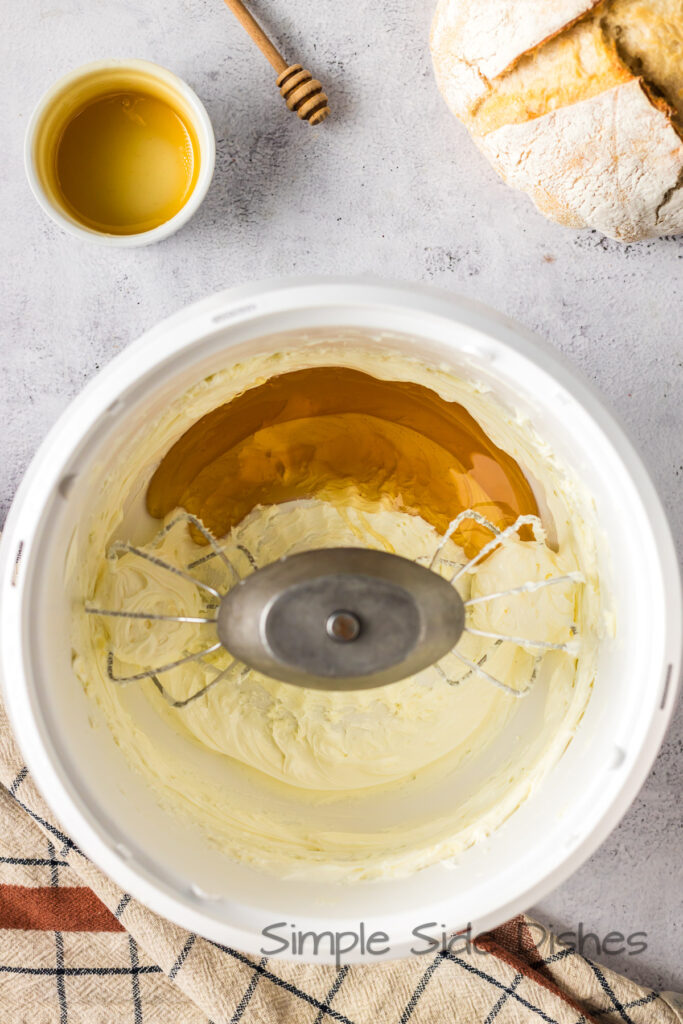 whipped butter in a mixer. Honey added to whipped butter.