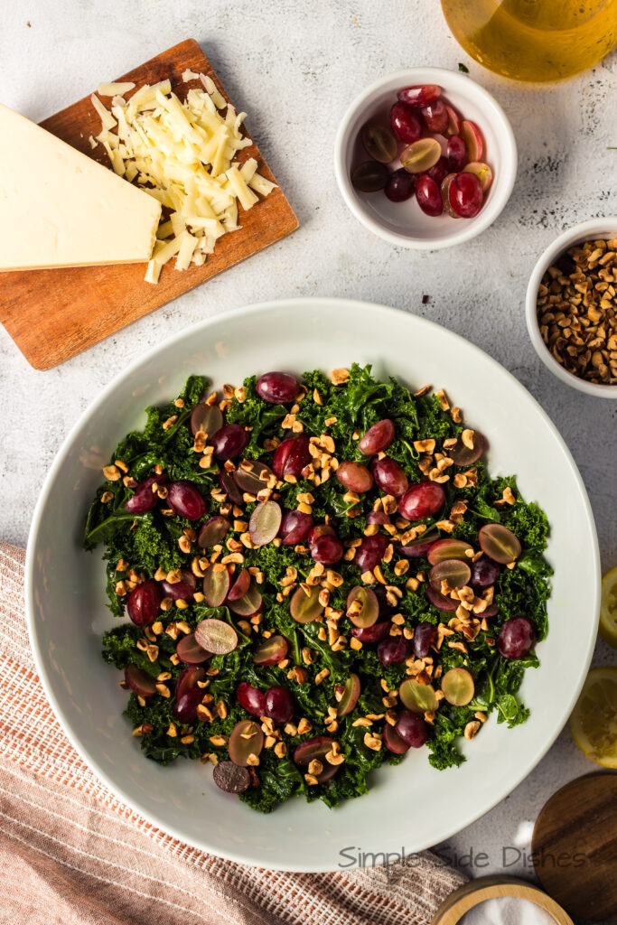 chopped hazelnuts added to kale and grapes.