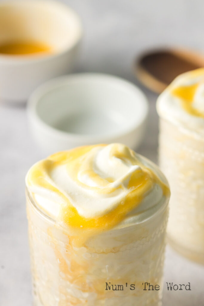 zoomed in side angle of peach fool in a cup.