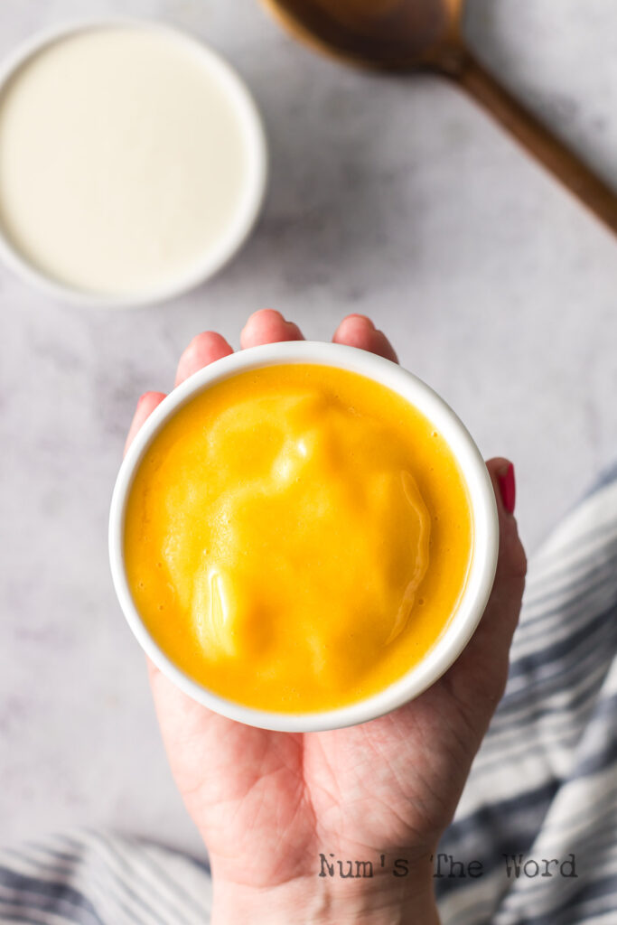 pureed peaches in a bowl.